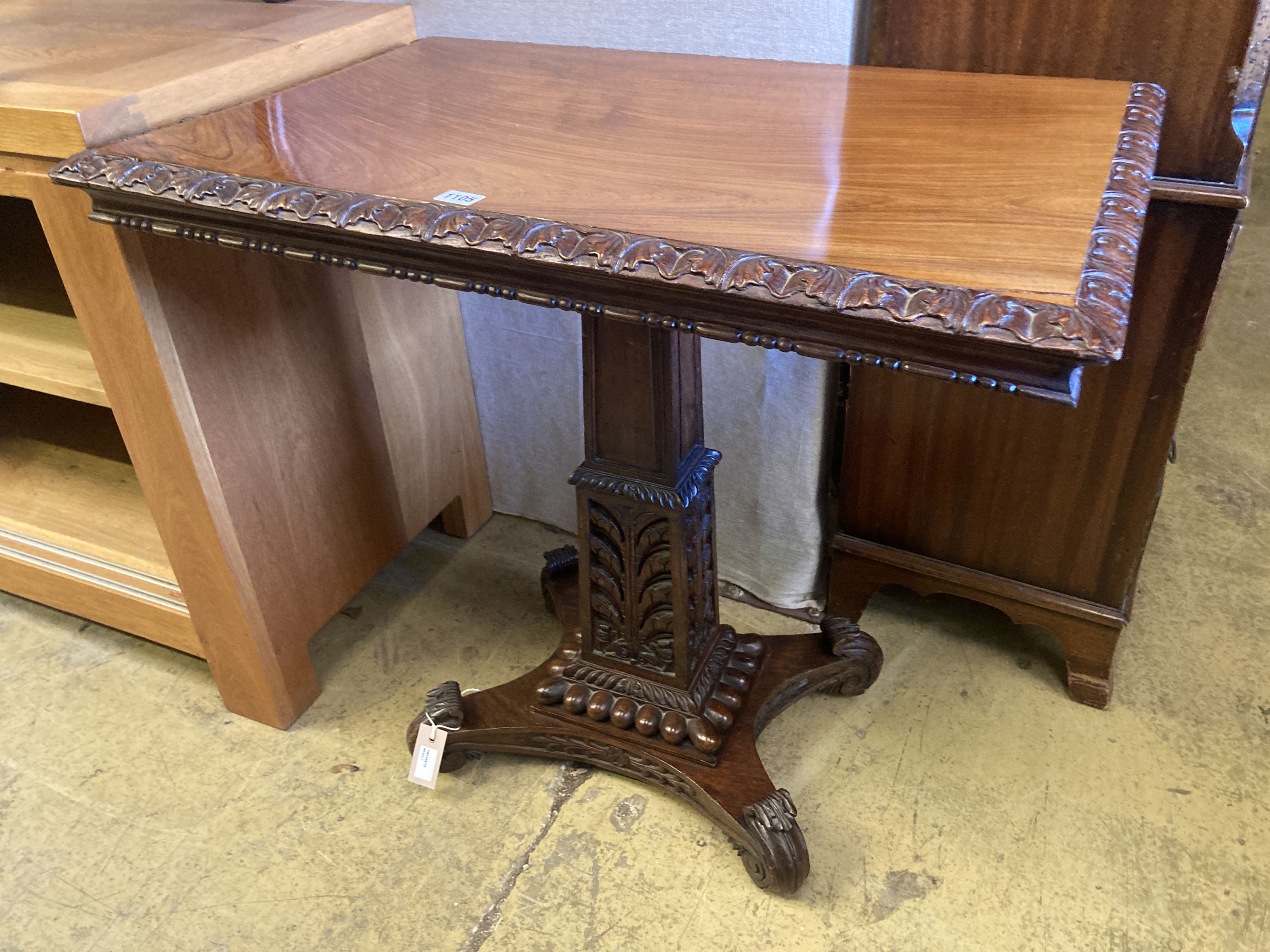 A 19th century Anglo Indian rectangular padouk tilt-top table, width 83cm, depth 55cm, height 77cm